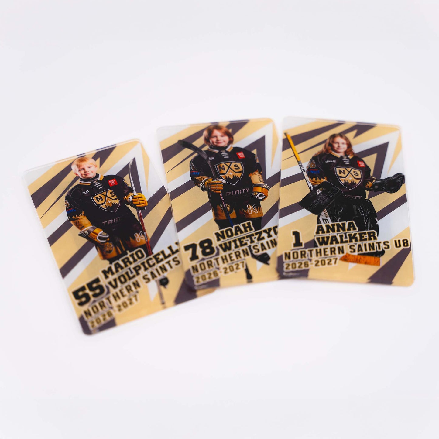 Three hockey player magnets featuring players from the Northern Saints team on a white background.