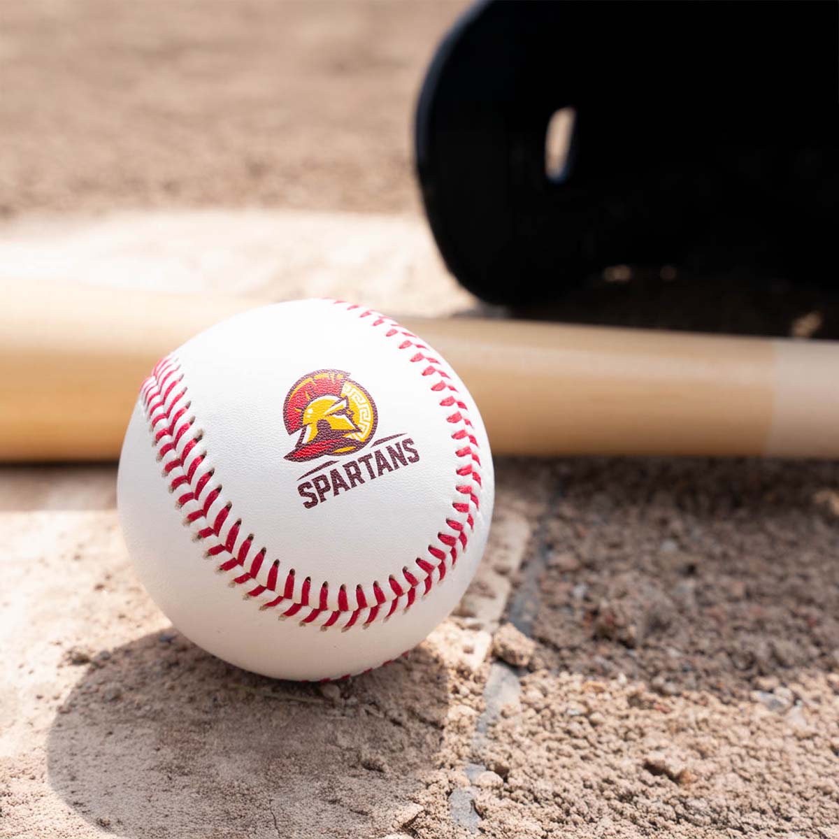 logo printed baseball on home plate