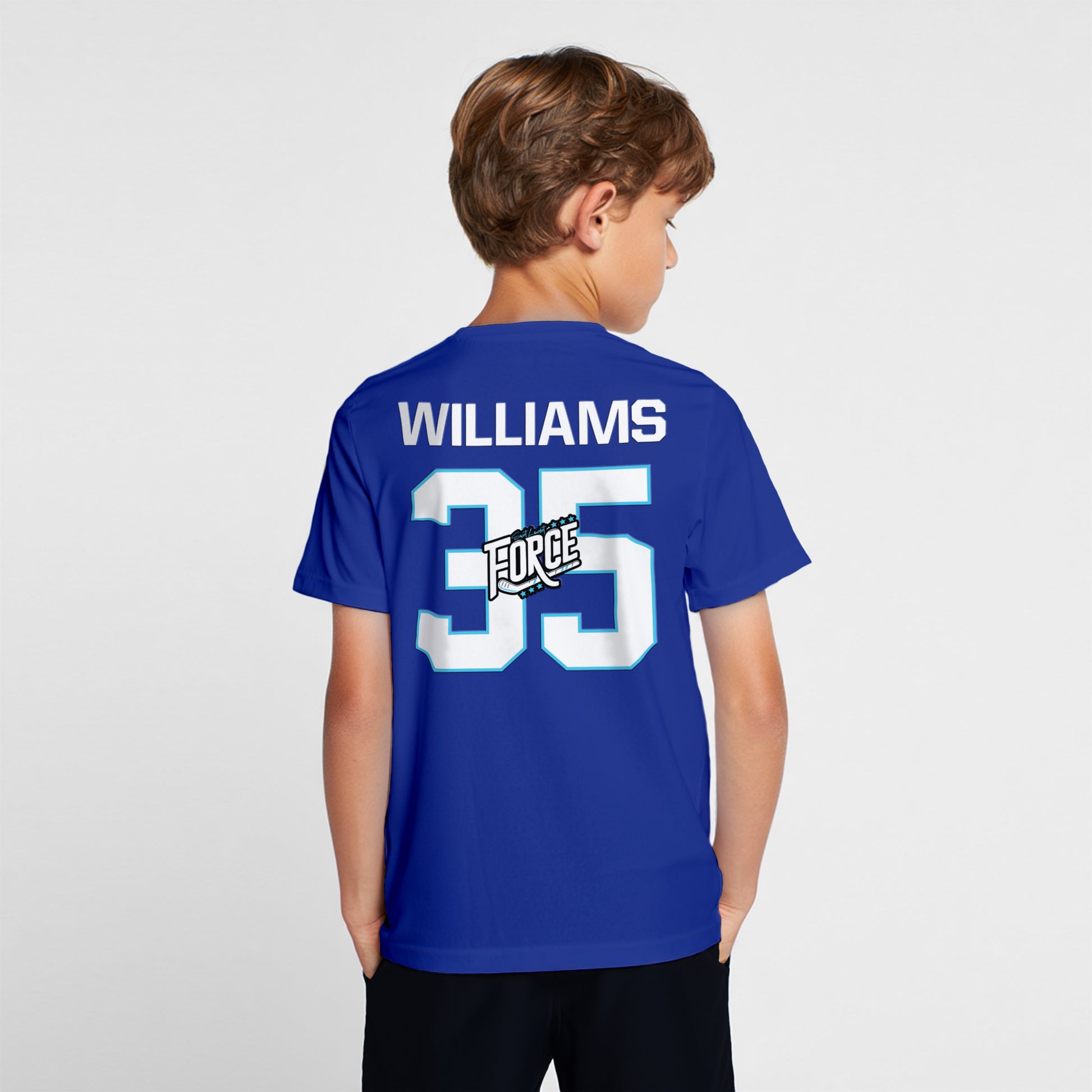 Child wearing a blue sports tshirt with name and number printed on the back