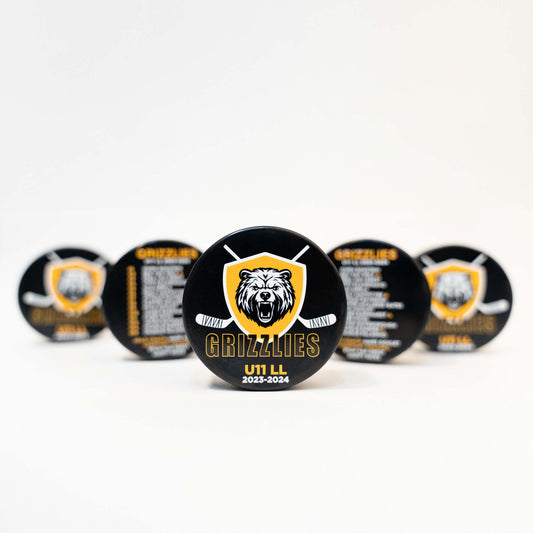 Custom printed hockey pucks with team logo