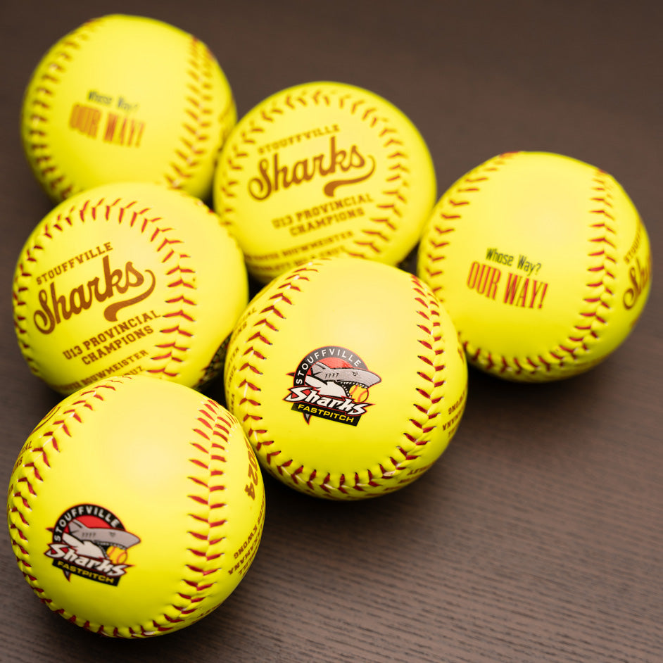 Softballs personalized with team roster and team logo