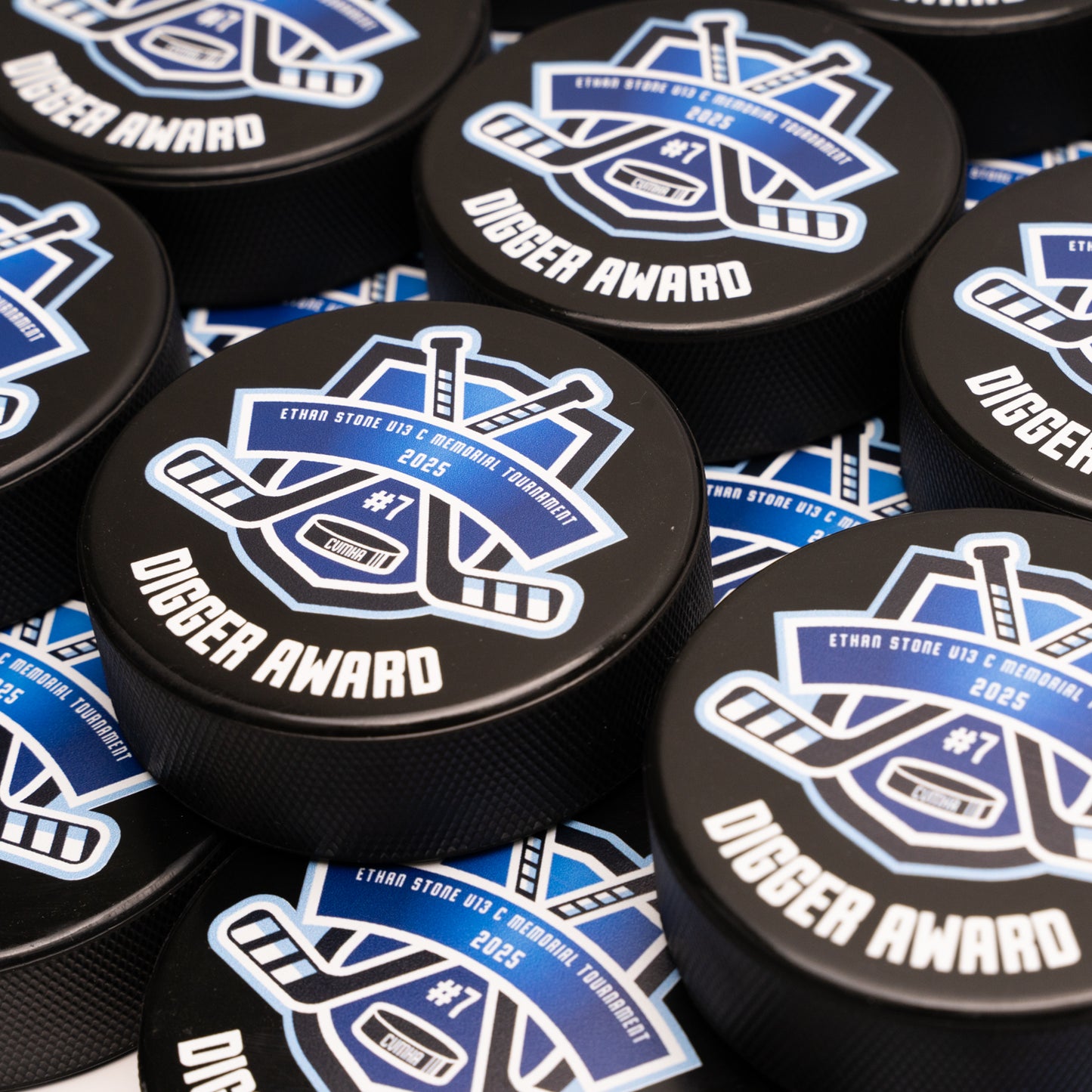 Personalized pucks for sponsors