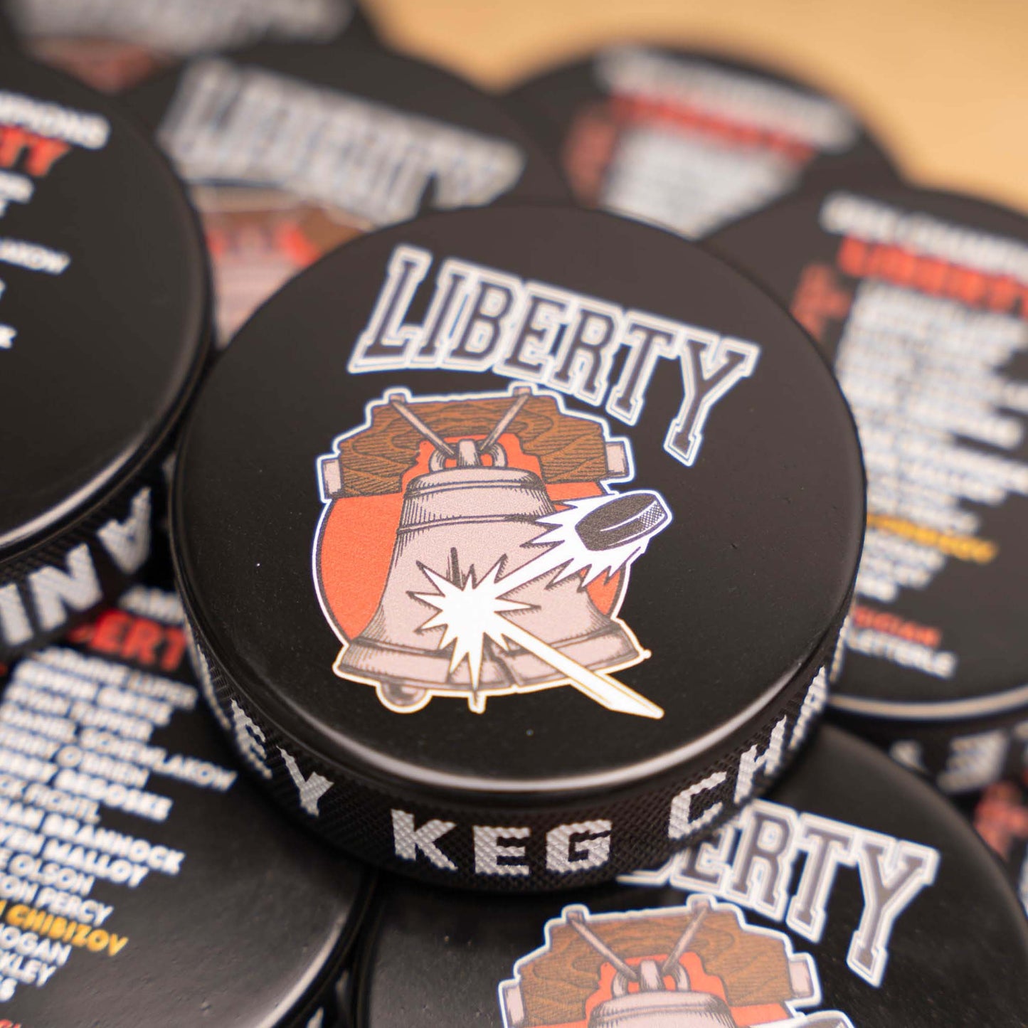 Unique Custom Printed Hockey Pucks with Edge Wrap-Around Text and Logo
