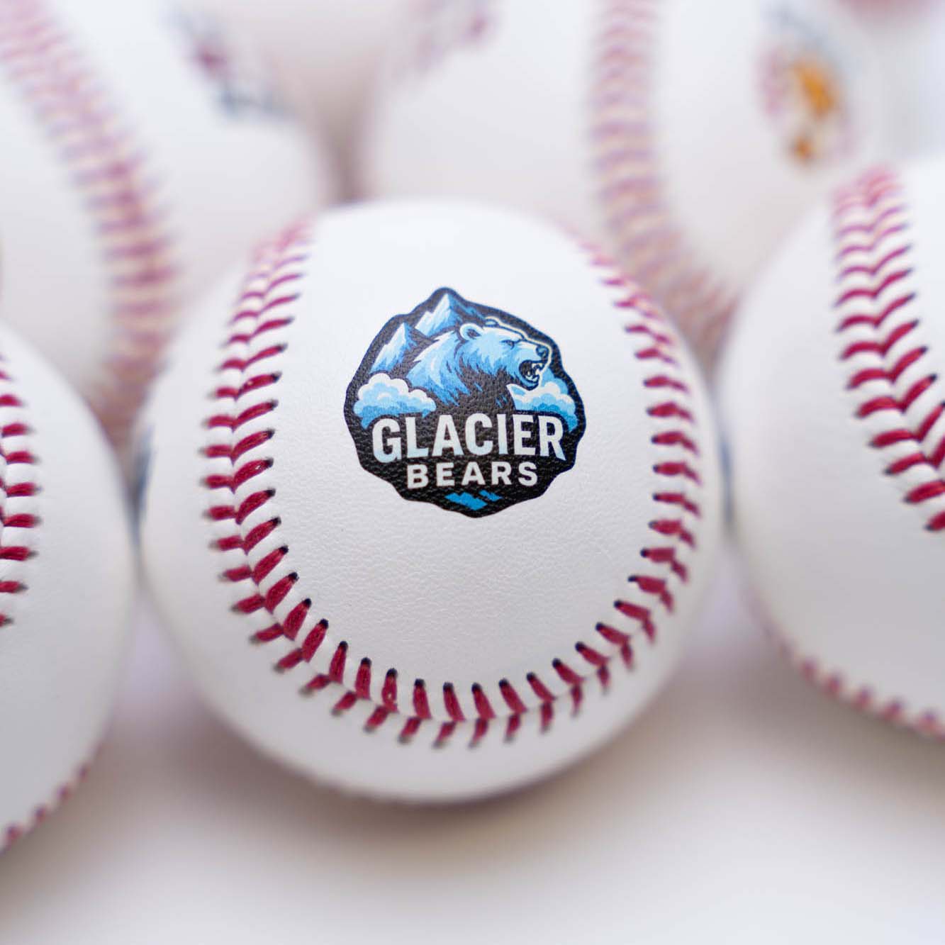 Baseball with Glacier Bears logo printed on it