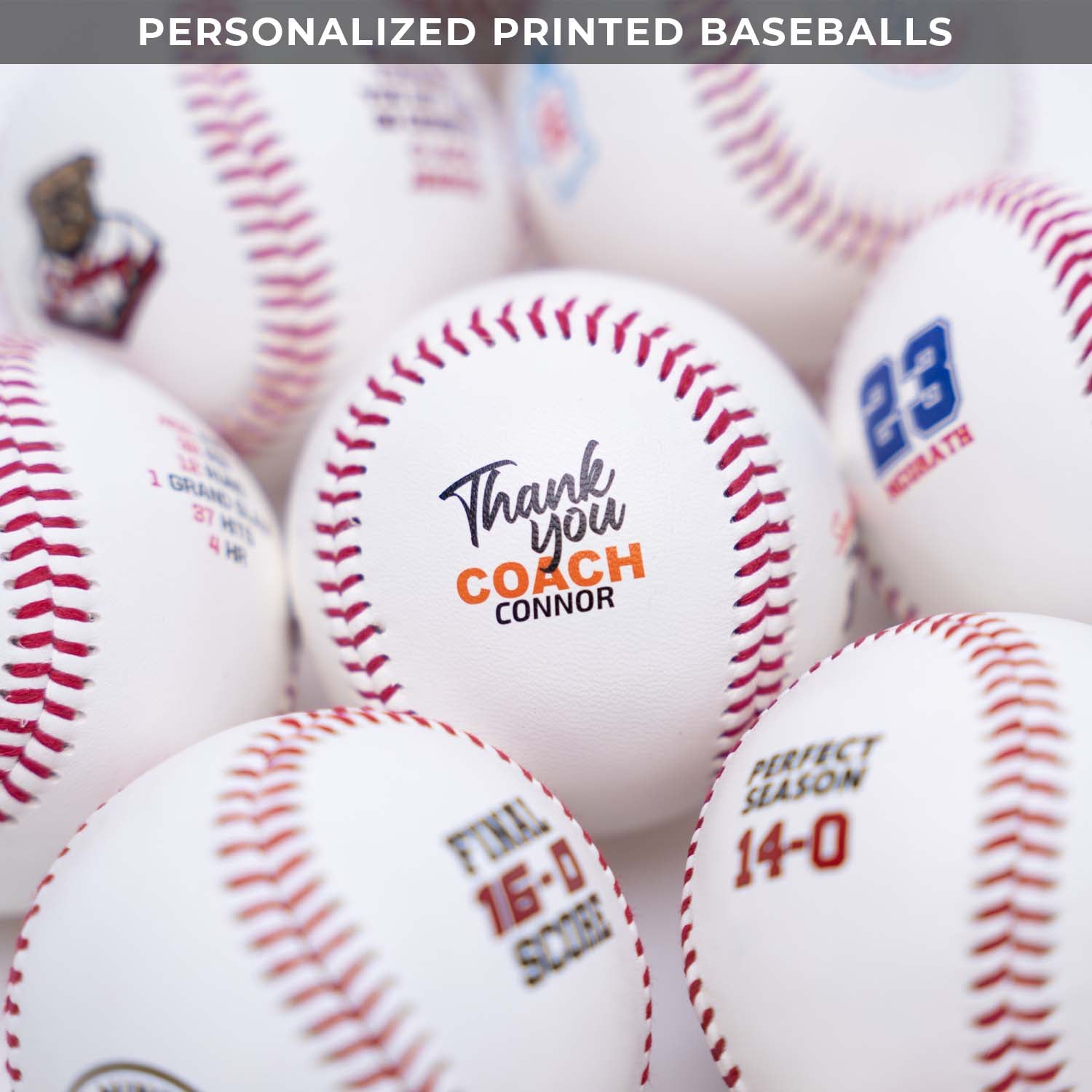 Personalized printed baseballs with various messages and numbers on a white background
