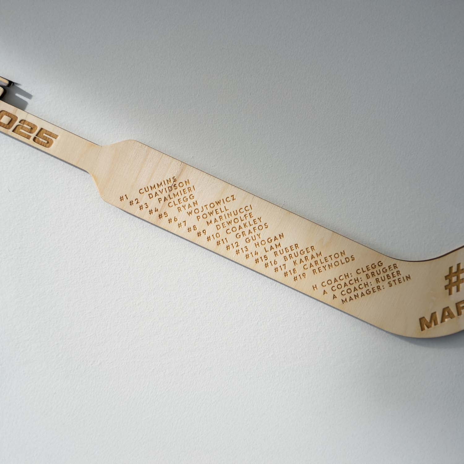 engraved roster on mini goalie hockey stick