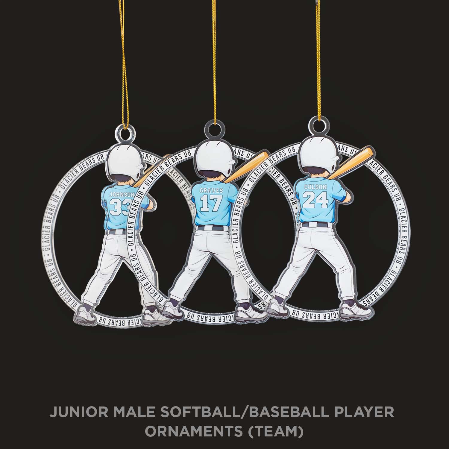 Three baseball player ornaments with numbers on a black background