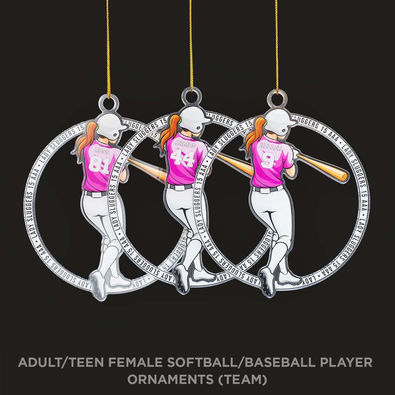 Three softball/baseball player ornaments on a black background